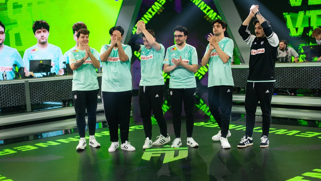 FUT Esports Valorant players celebrate together on stage